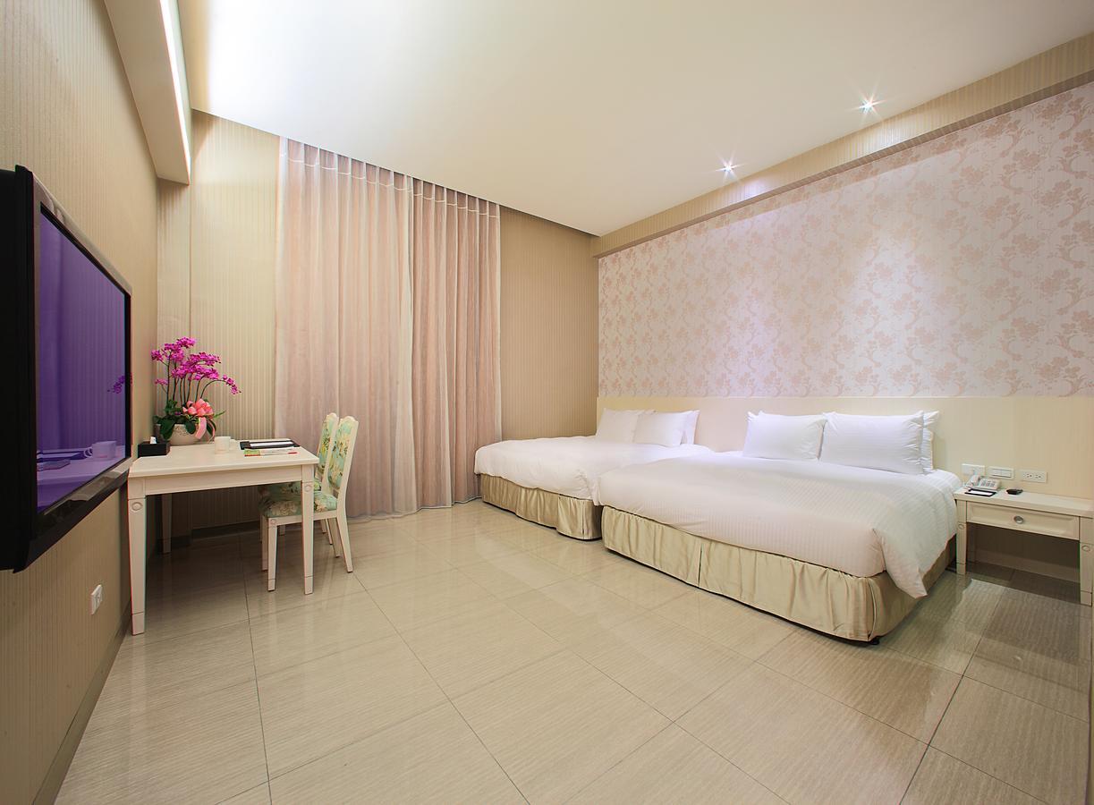 Larchotel Shanhua Quarto foto